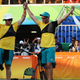 The Aussies celebrate winning bronze, but mostly being able to go to the beach now; Photo credit: Paul Gilham/Getty Images